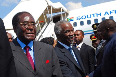 President of Zimbabwe Robert Mugabe and former South African president Thabo Mbeki (file photo).