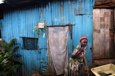 An elderly woman in a slum in Kenya.