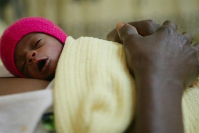 Stunningly small  A newborn lies on his mothers chest.  Low birthweight babies often weigh less than two pounds  about five pounds lighter than the average for healthy babies in high-income countries.