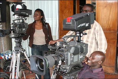 Camera crew: Govt has been blocked from cancelling broadcast licences pending a case by media owners.
