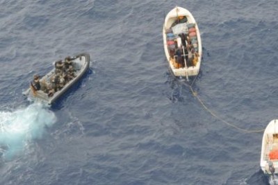 EUNAVFOR soldiers apprehend a group of suspected pirates.
