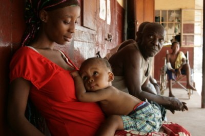 A woman and her child at a government hospital in Makeni.