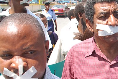 Journalists in Nairobi take part in a demonstration to protests against gag on press freedoms.