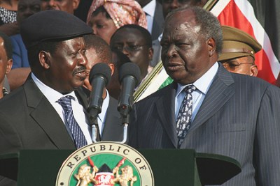 President Mwai KIbaki with Prime Minister Raila Odinga shortly after addressing the nation from KICC, Nairobi (file photo).