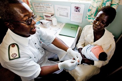 A nurse at the Chiparawe Clinic, Marondera, administers a HIV test.