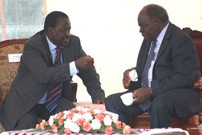 President Kibaki (right) and Prime Minister Raila Odinga.