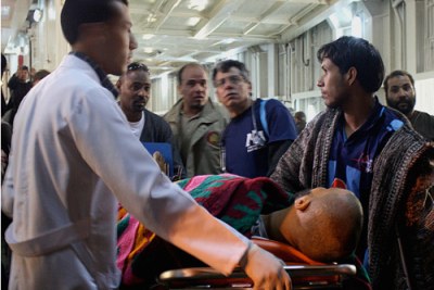 File photo: An injured man from Misrata is met by a team of paramedics.