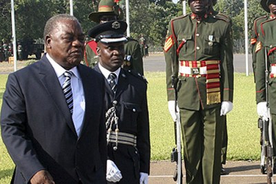 (file photo) Former president Rupiah Banda inspects a guard of honour.