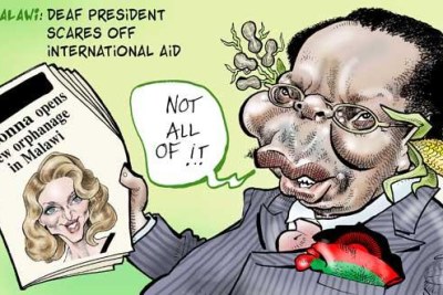 Former President Bingu wa Mutharika of Malawi with a portrayal of superstar Madonna.