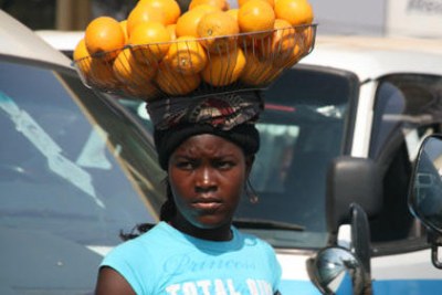 Selling oranges in Lusaka.
