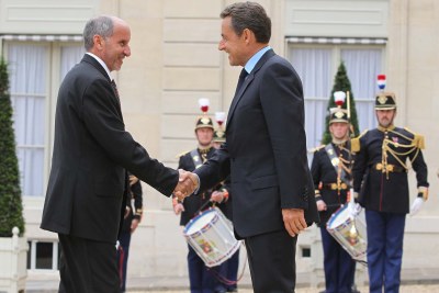 President Nicolas Sarkozy of France, right, greeting interim Libyan leader Mustafa Abdel Jalil on a visit to Paris.