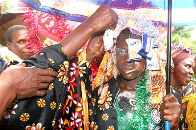 Kenyan girls are congratulated and decorated after undergoing the rites of initiation called Esaro as friends and relatives join in the celebrations.