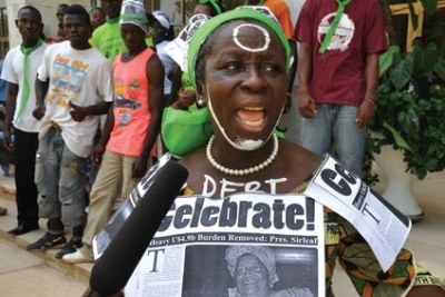 Broh celebrating Liberia debt waiver. (file photo)
