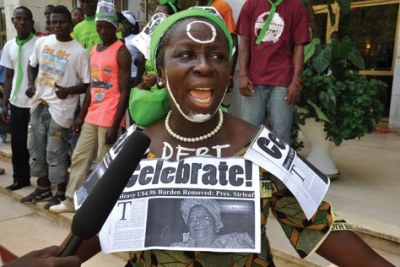 Ms. Broh celebrating Liberias debt waiver
