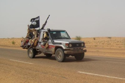 Members of Movement for Unity and Jihad in West Africa approach Timbuktu (file photo).