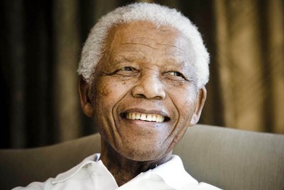 Nelson Mandela smiles during a meeting in Johannesburg (file photo).