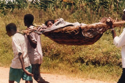 A woman being taken to hospital to deliver