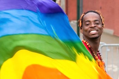 Displaying the rainbow flag of gay rights activists: Malawi's anti-gay laws punish consensual same-sex conduct with prison sentences of up to 14 years for men and 5 years for women.