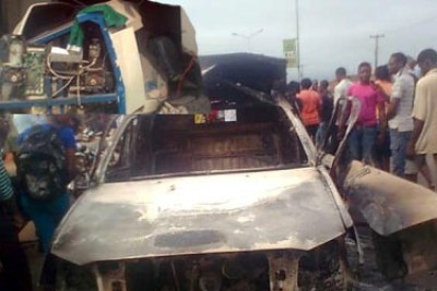 An ATM at GTBank and a police patrol van destroyed by the robbers