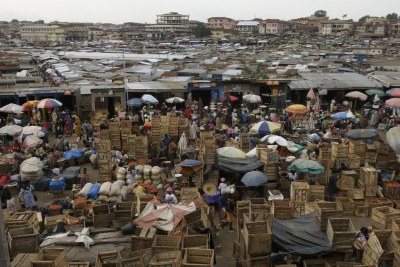 Overlooking the central Kumasi market at closing time.