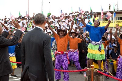 Dancers greet President Obama and President Kikwete during departure ceremony at airport in Dar es Salaam.
