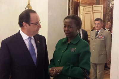 Rwandan Minister of Foreign Affairs and Cooperation, Louise Mushikiwabo, speaks with French President Francois Hollande at the Elysée Summit in Paris. The summit, which took place two days after UN approval of French intervention in Central African Republic, was dominated by peace and security matters, though economic partnership and climate change were also on the table.