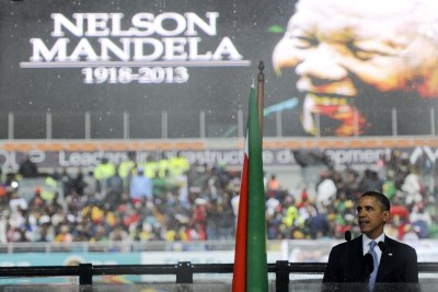 (Photo d'archives) - Le président américain Barack Obama s'exprime au service commémoratif de Nelson Mandela au Stade FNB de Soweto.