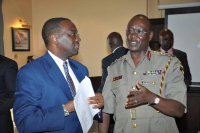 Kenya's Inspector General of Police, David Kimaiyo together with Chief Justice, Dr. Willy Mutunga (file photo).