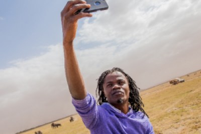 Juliani takes a selfie during the tour of the Amboseli National Park.