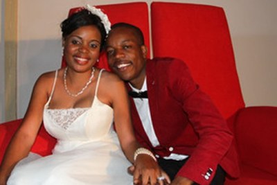 Sharon Macheso poses with her husband Kudakwashe Munetsi at their wedding.