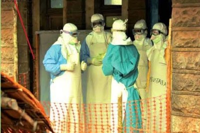 Health workers donning protective suits during an Ebola epidemic in Northeastern DRC (file photo).