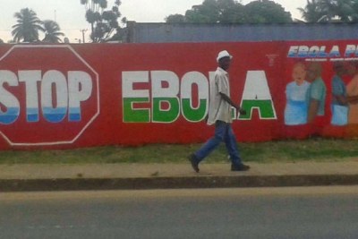 A Stop Ebola sign along a major Monrovia street.