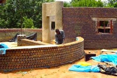 To build a two bedroom, 1200 square foot home, it takes about 14,000 bottles.