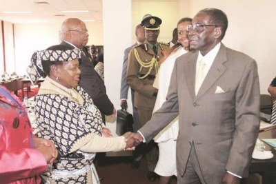 President Robert Mugabe arrives at Zanu-PF headquarters (file photo).