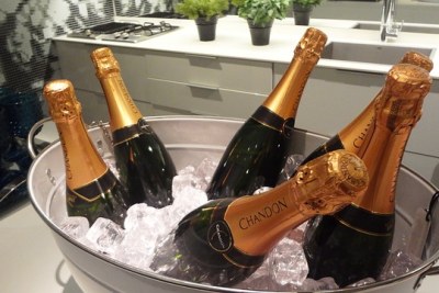Bottles of champagne in a bucket.