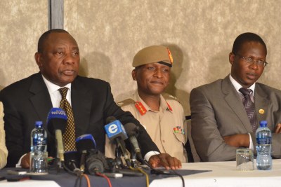 From left, South African Deputy President Cyril Ramaphosa, regional mediator on Lesotho, with Lt. Gen. Tlali Kamoli, who was later appointed the country's military chief, and Brigadier Maaparankoe Mahao, who was fired to make way for Kamoli and was later assassinated.