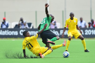 Zimbabwe Warriors and Zambia's Chipolopolo boys in action.