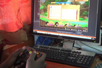 A Kiro'o Games programmer tests a build of video game the Aurion: Legacy of the Kori-Odan for bugs (file photo).
