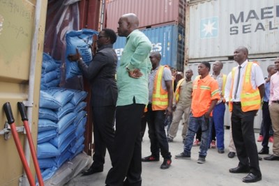 Dar es Salaam Regional Commissioner Paul Makonda inspects transit sugar consignment.