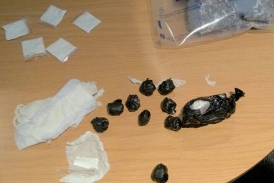 The cocaine was concealed in a pair of socks, wrapped in black pieces of plastic.