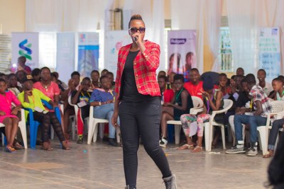 Keko giving her testimony about her triumph against drug abuse.