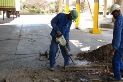 Construction workers in Tanzania (file photo).