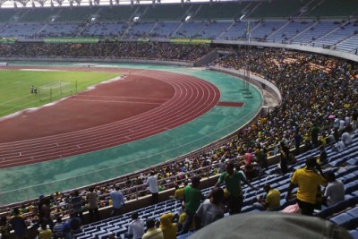 Tanzanian stadium filled with Yanga and Simba fans.
