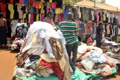 Heaps of second-hand clothes stacked together in Uganda.