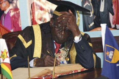 President Robert Mugabe wearing two watches.