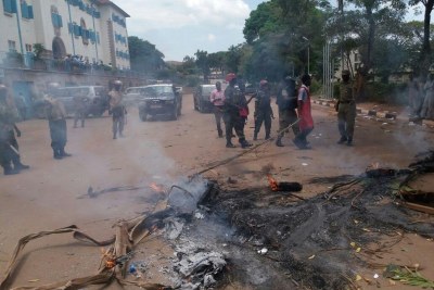 The striking students burning tyres at Makerere university.