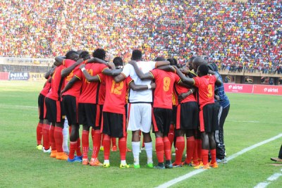 The Uganda Cranes team praying (file photo).