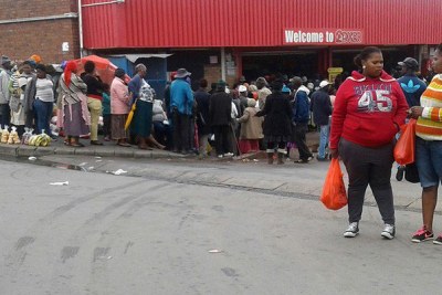 People queue for social grants in Mdantsane, East London.