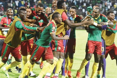 Camerounians celebrate their victory against Ghana