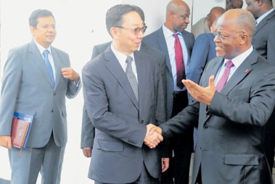 President John Magufuli and Deputy Director of the International Monetary Fund, Tao Zhang.